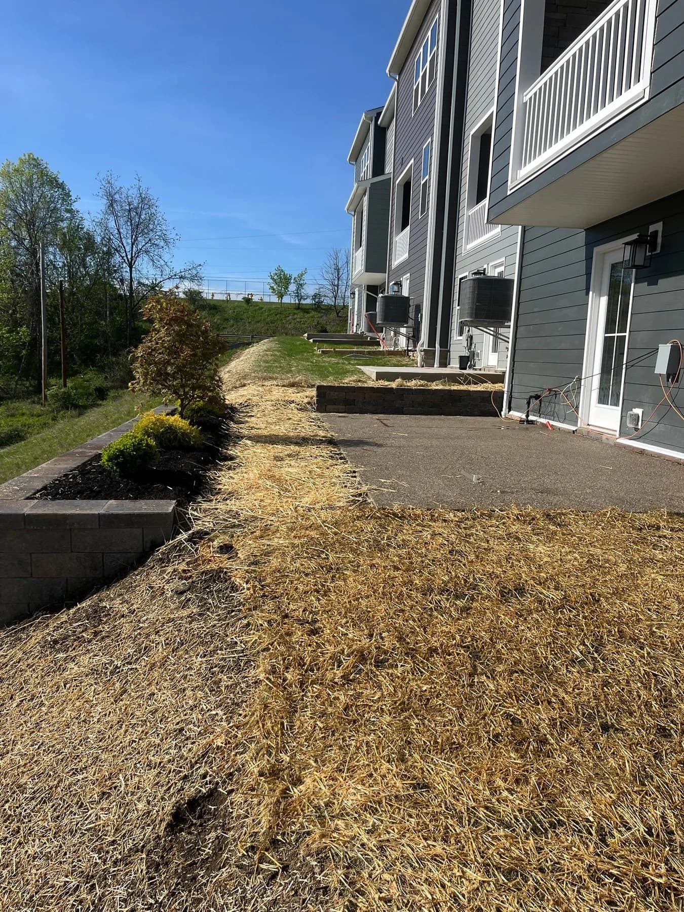 Freshly graded and matted slope after Corwin dirt work